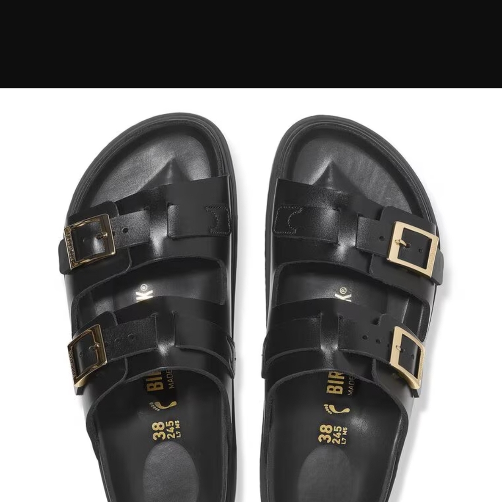Birkenstock Black Sandals with Gold Accents